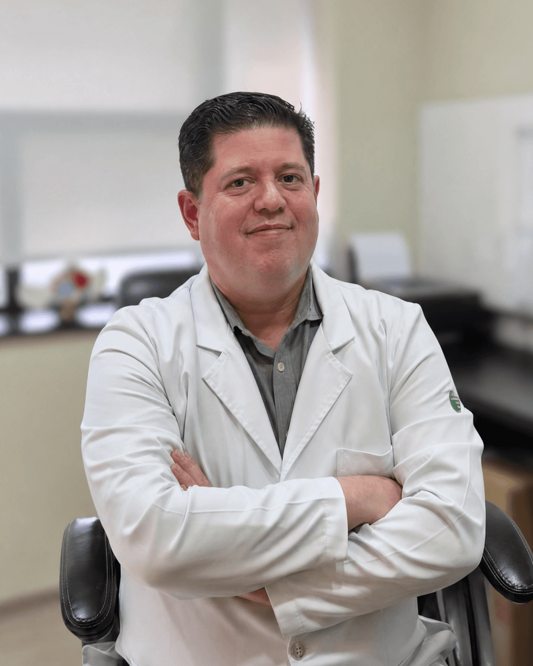 Retrato do Dr. Marcelo Gusmão, especialista em Obstetrícia.